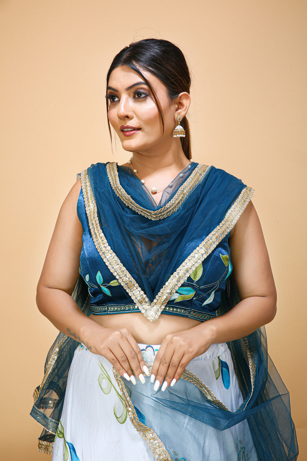 Pretty Hand Embroidered Choli with Flower Printed Skirt