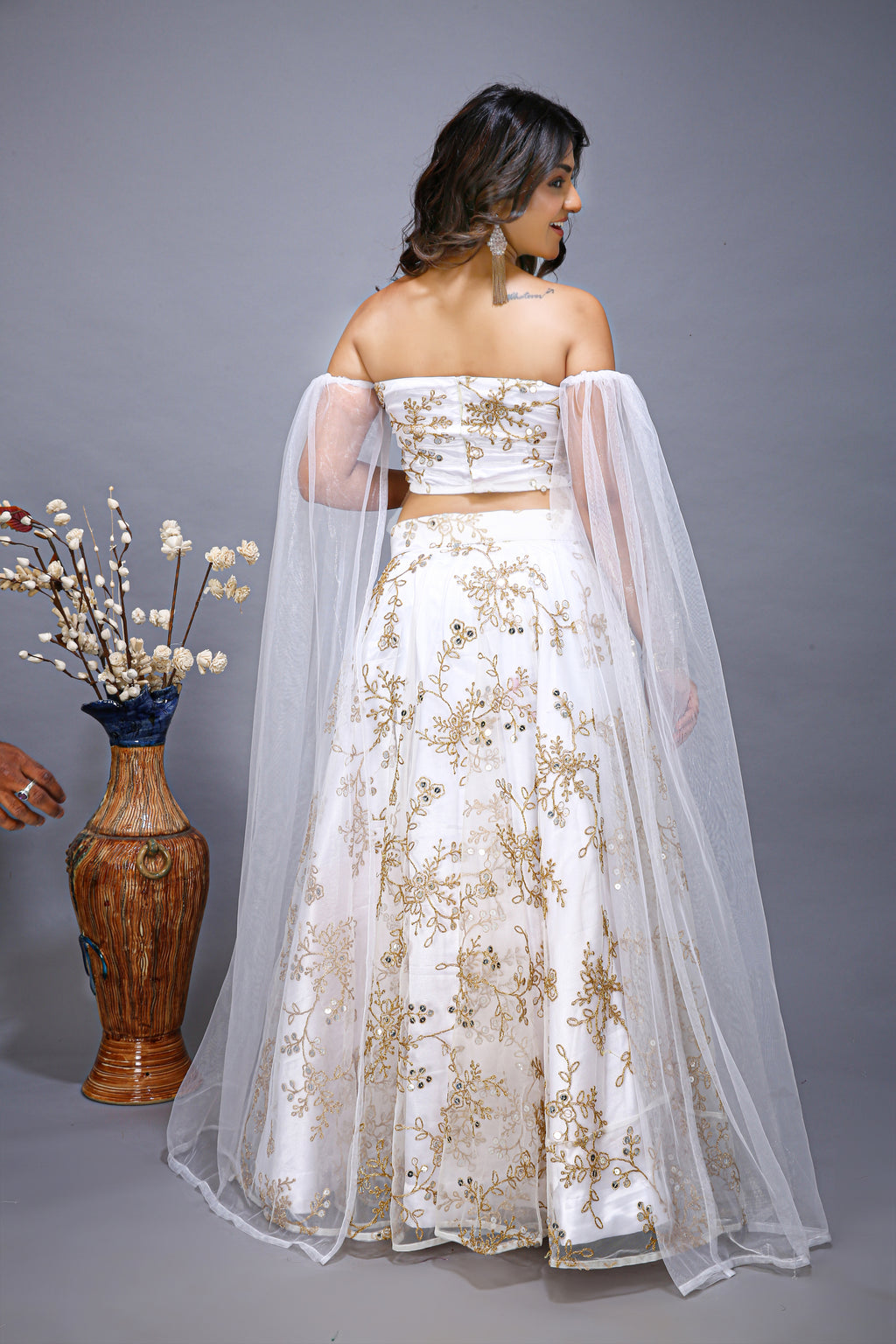 Ruffle Net Sleev Embroidered Lehenga Choli - back view