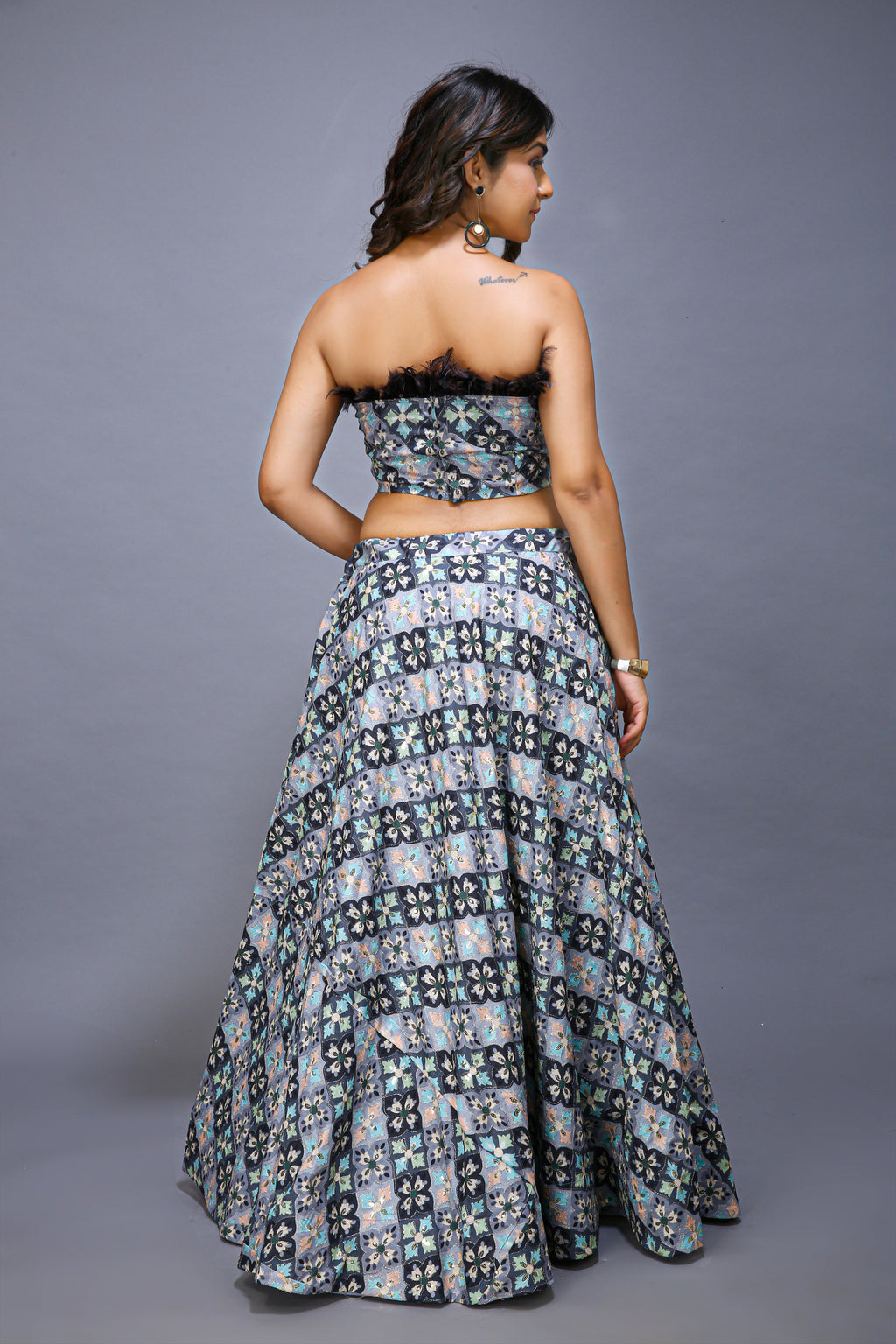 Gray Lehenga choli Beautifully Crafted with Feathers - back view
