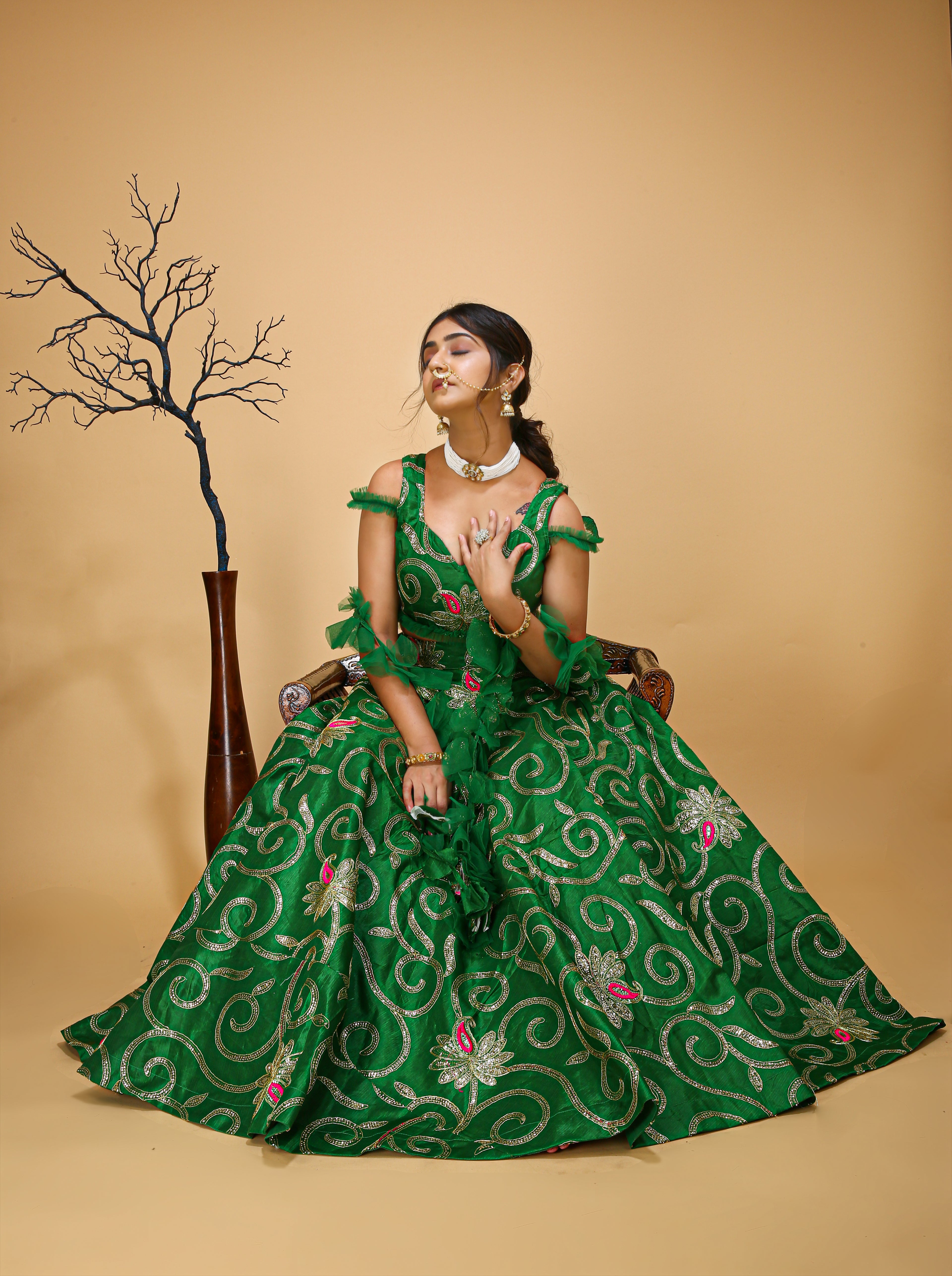 Queen Lehenga Choli With Green Traditional Vibes - sitting view